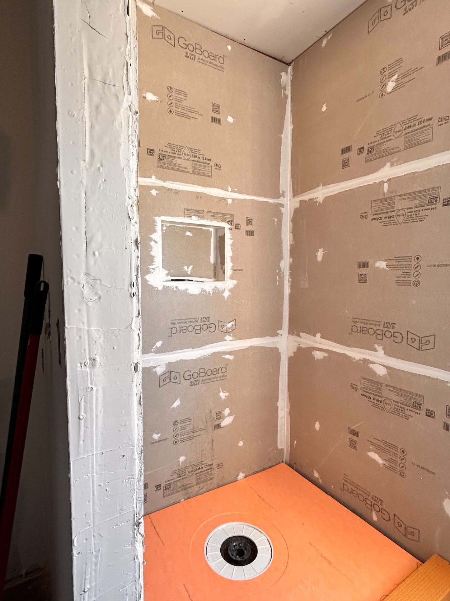 Shower walls and base prepared for tile